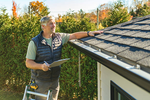 Professional Roofing technician working in Olema, CA